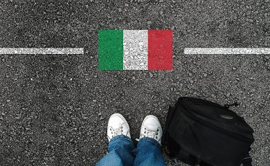 man with a shoes and flag of italy